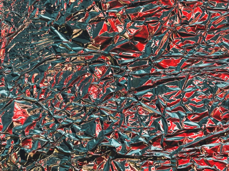 an abstract picture with red and black shapes