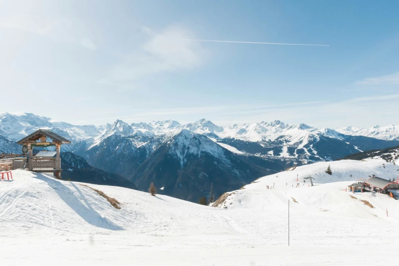 a skier is skiing on the snowy hill