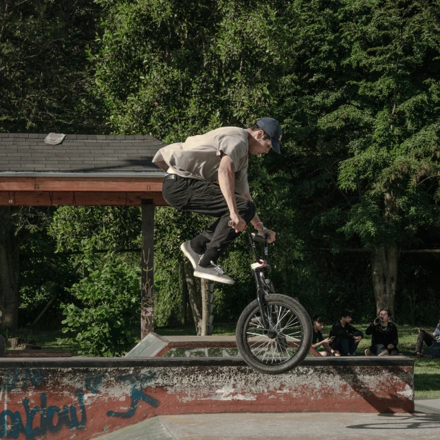 a man on a bike doing a trick