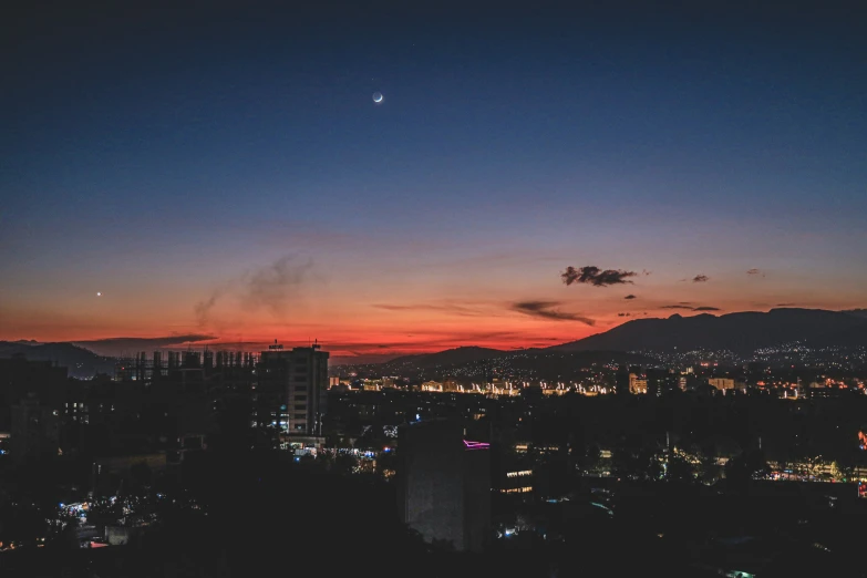 an image of a city with buildings and lights