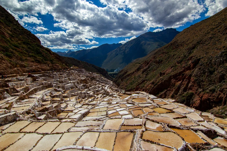 a street full of sand in a valley