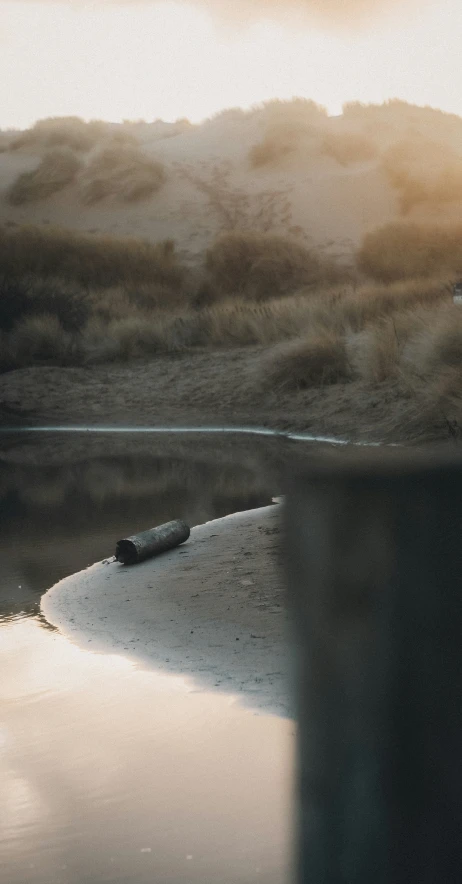 an abstract landscape with low water and hills