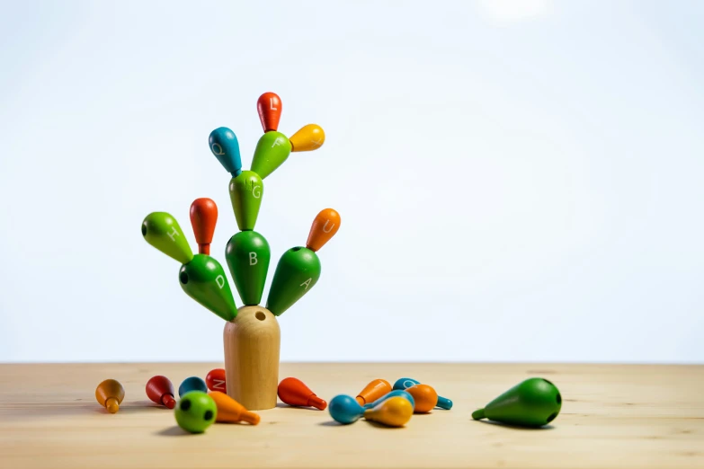 small colorful objects in the shape of cactuses