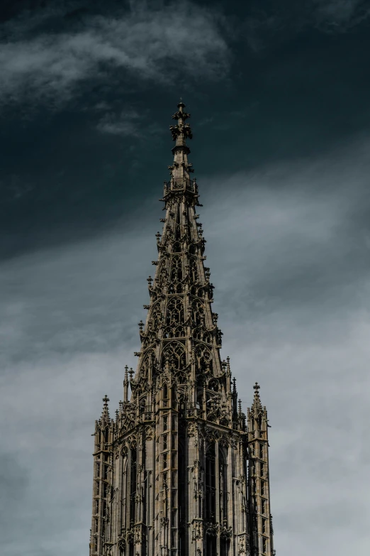 a tall building with ornate architecture and clock face