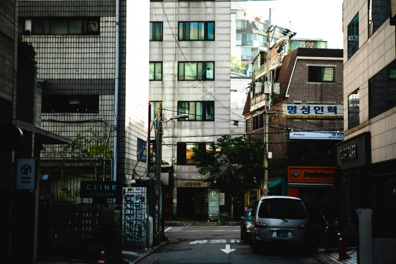 a car is stopped in an alley way