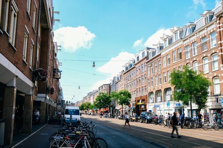 many bicycles are  on the sidewalk