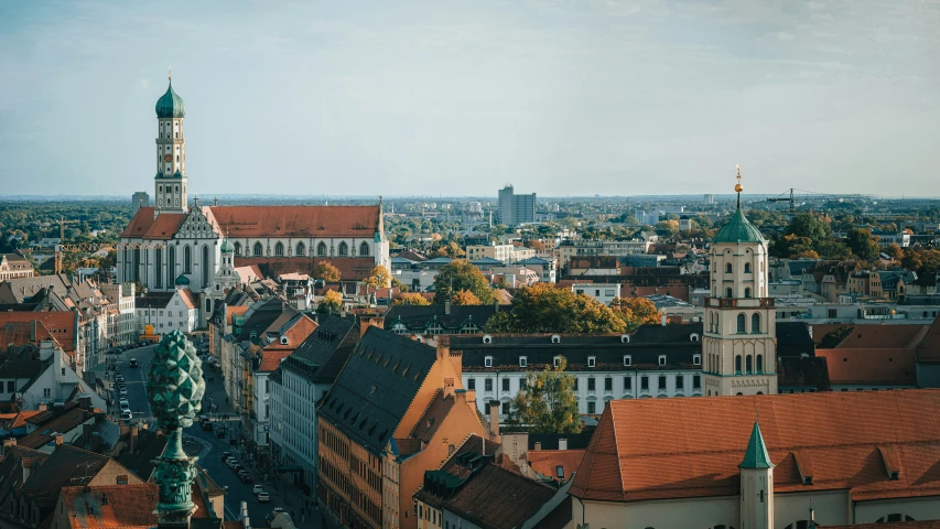 aerial view of city with several buildings and spires