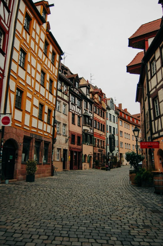 an image of several buildings in the streets