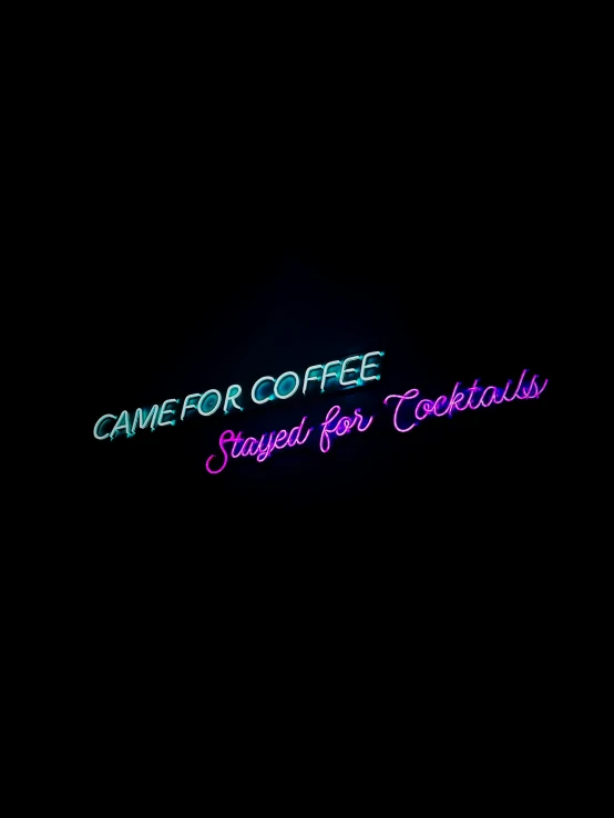 the neon logo for camper coffee is lit up