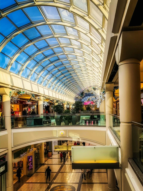 the inside of a large, multilevel mall