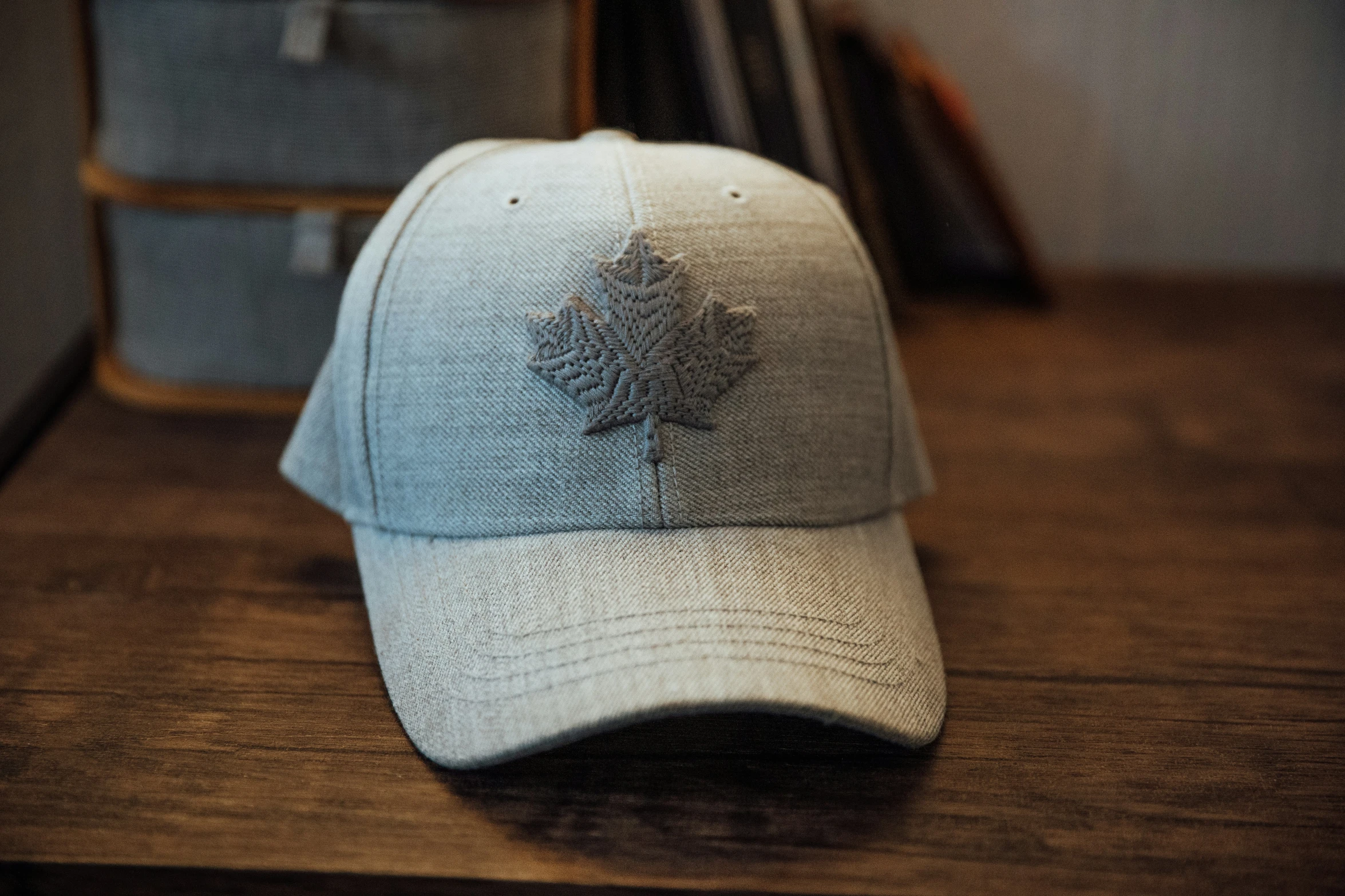 the back of a cap sitting on a desk