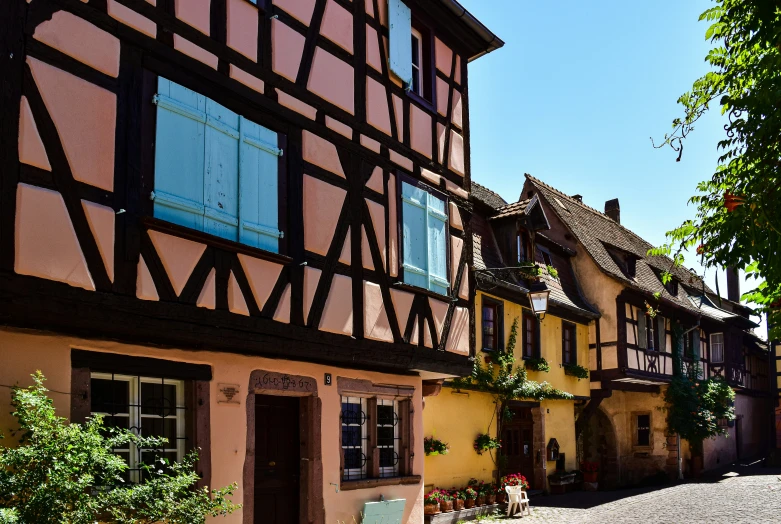 an old european style street lined with buildings