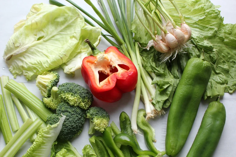 a pile of veggies and some green beans