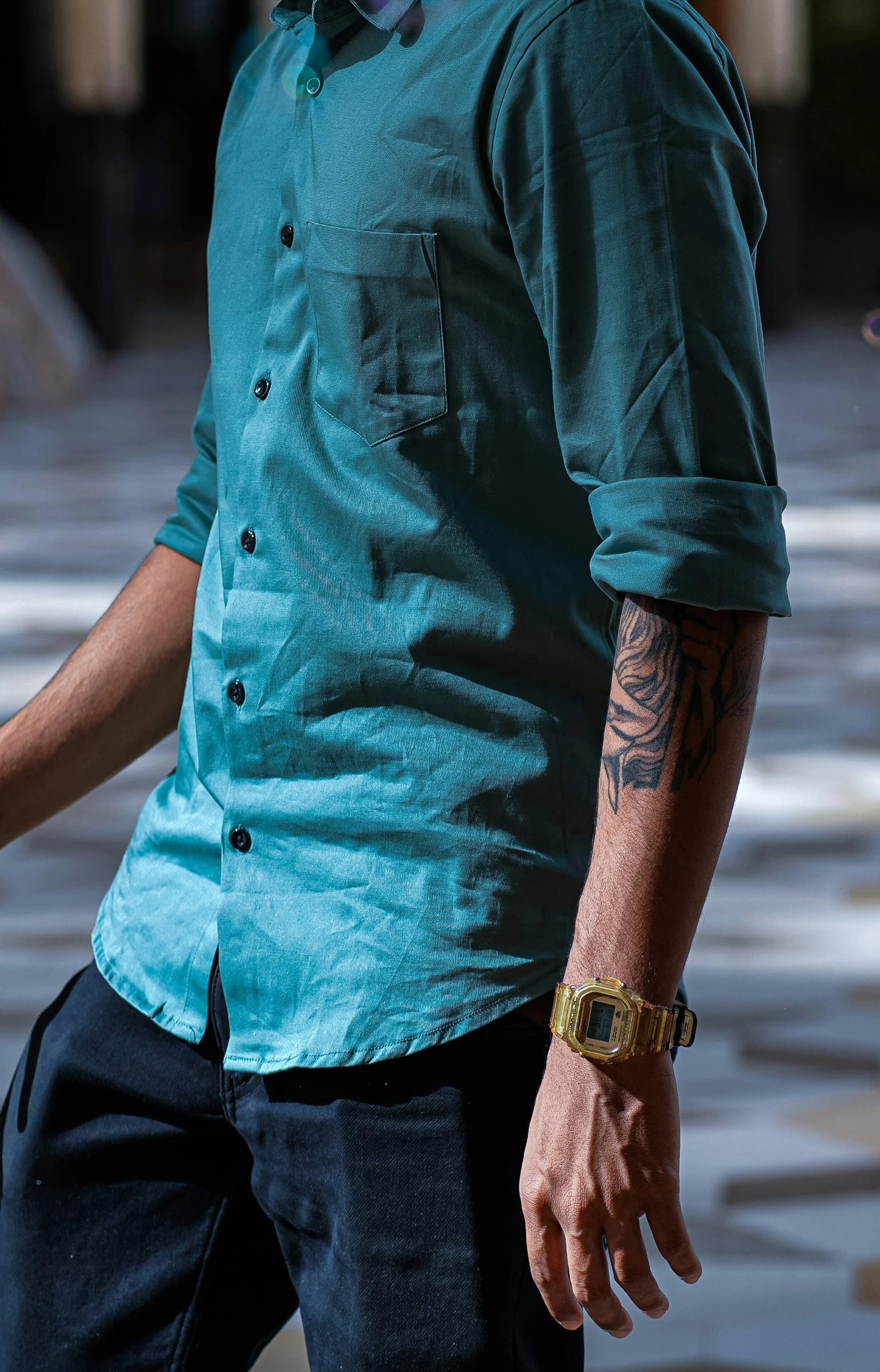 an older man with a clock on his arm