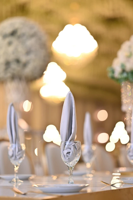 wedding decoration of the white tables and silverware