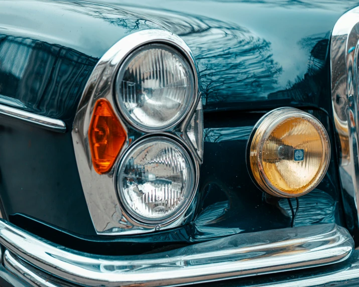 the front lights of a black car