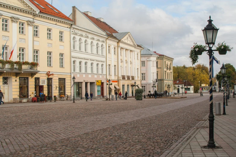 a large city street with some buildings near by