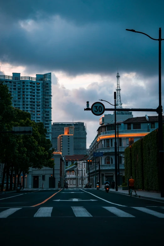 a street with a stop light in the middle