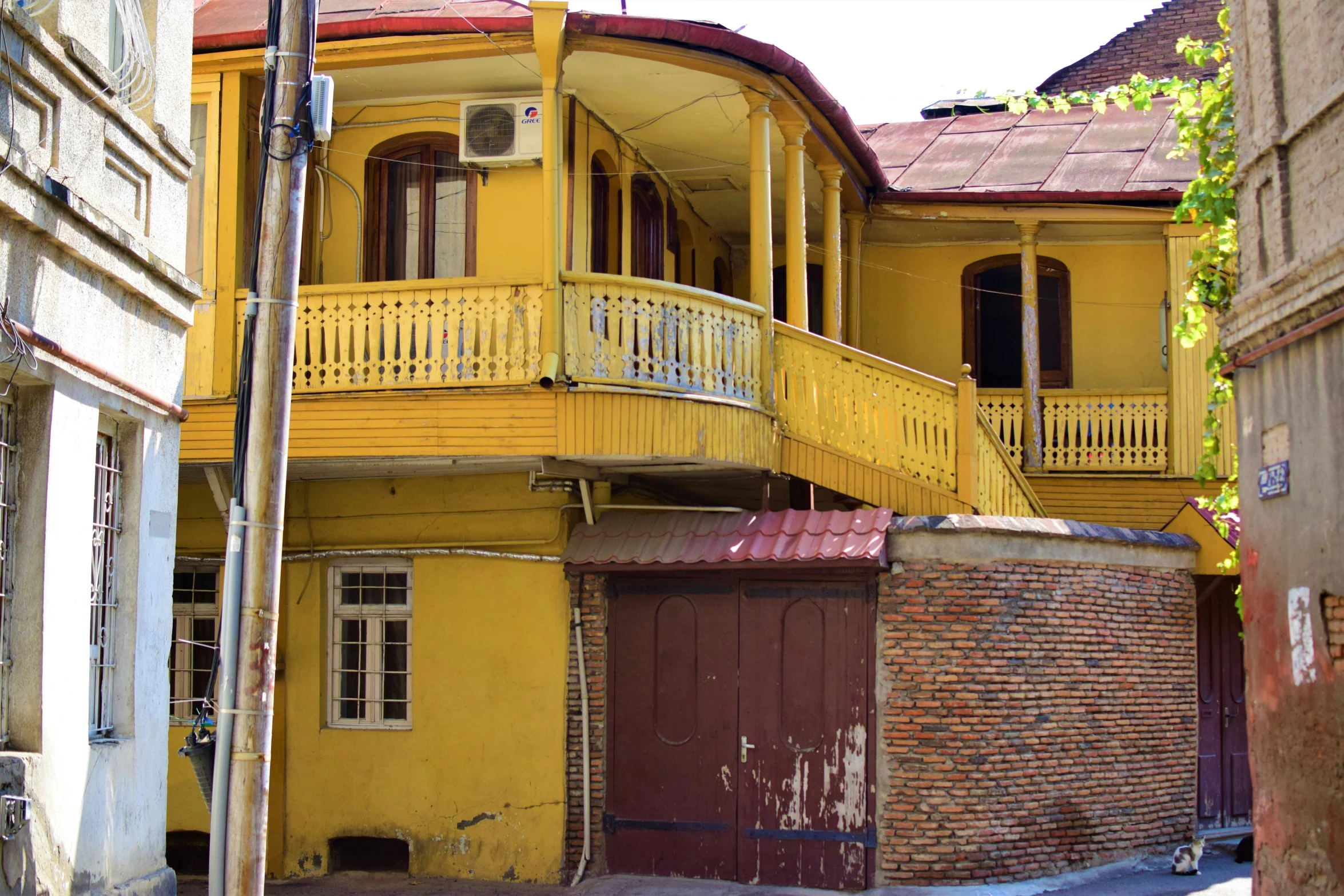 there is a yellow building that has been painted yellow