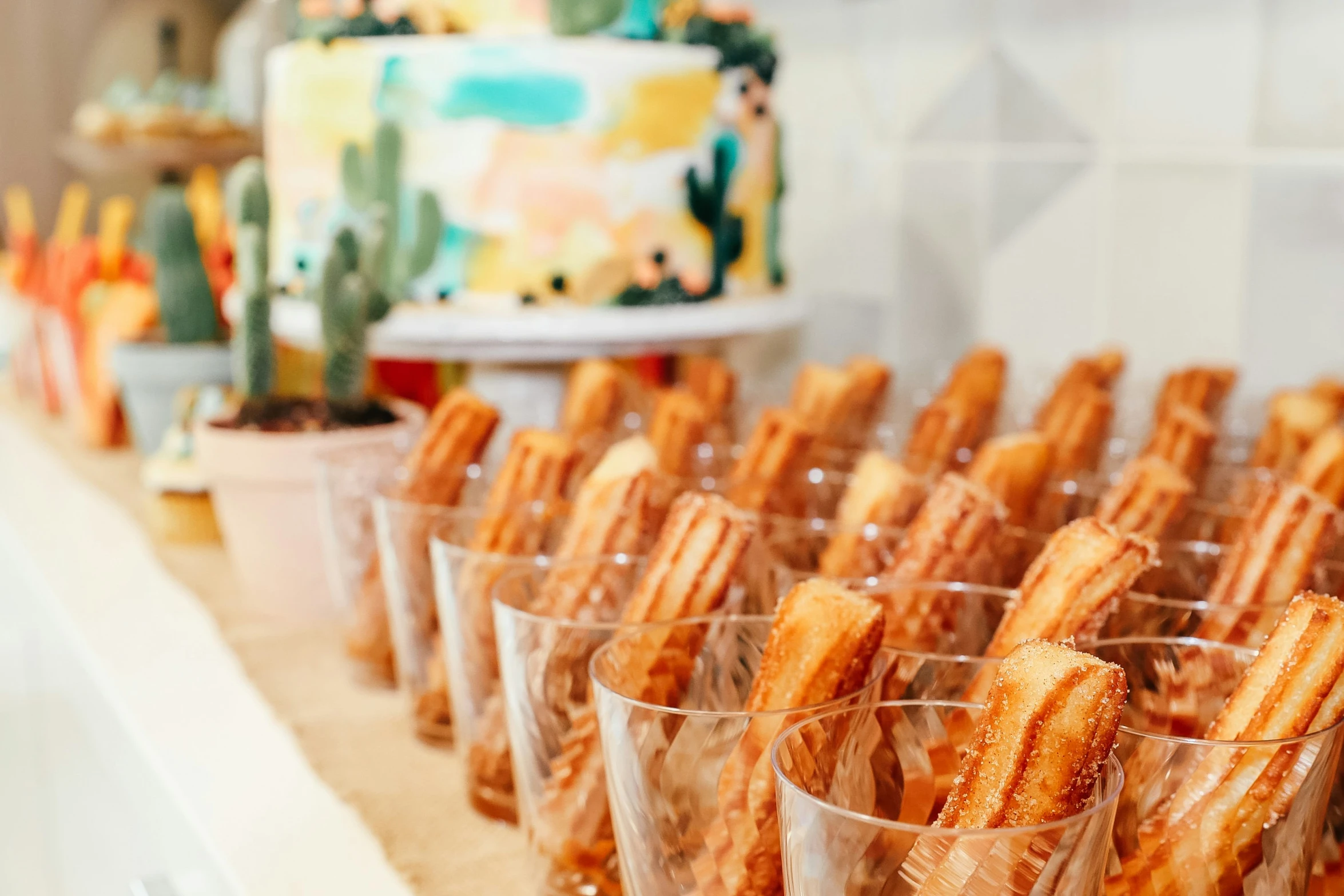 some small snacks in cups sitting on a table