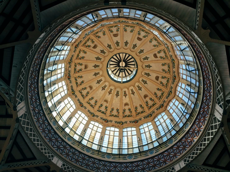 the inside of a large building with a glass ceiling