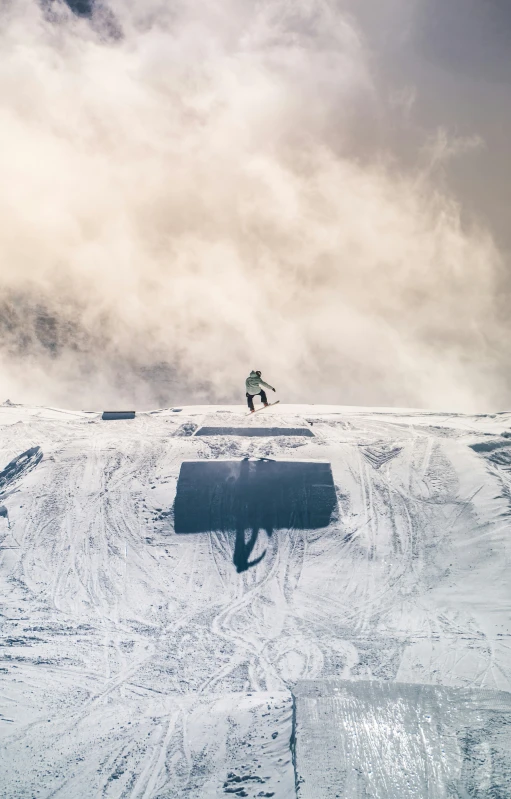 the skier has jumped off the slope on his skis