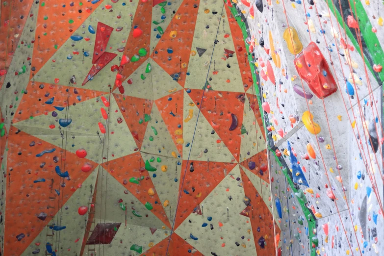 the climb wall has different climbing devices to take in