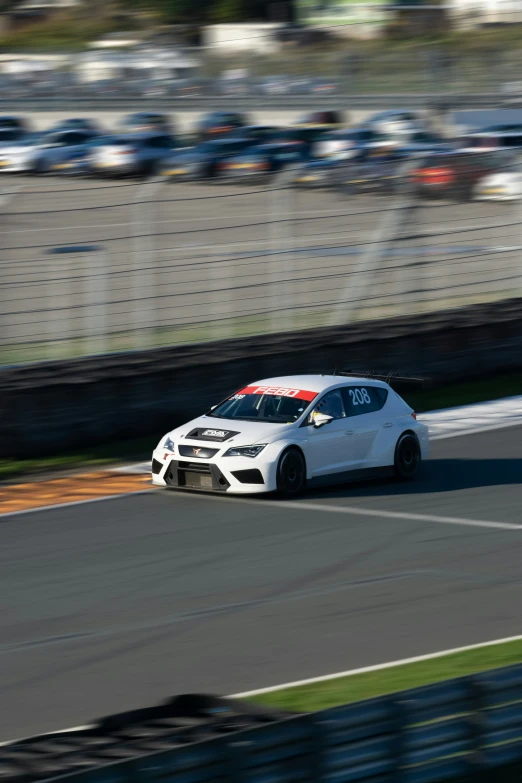 a car is driving down the race track