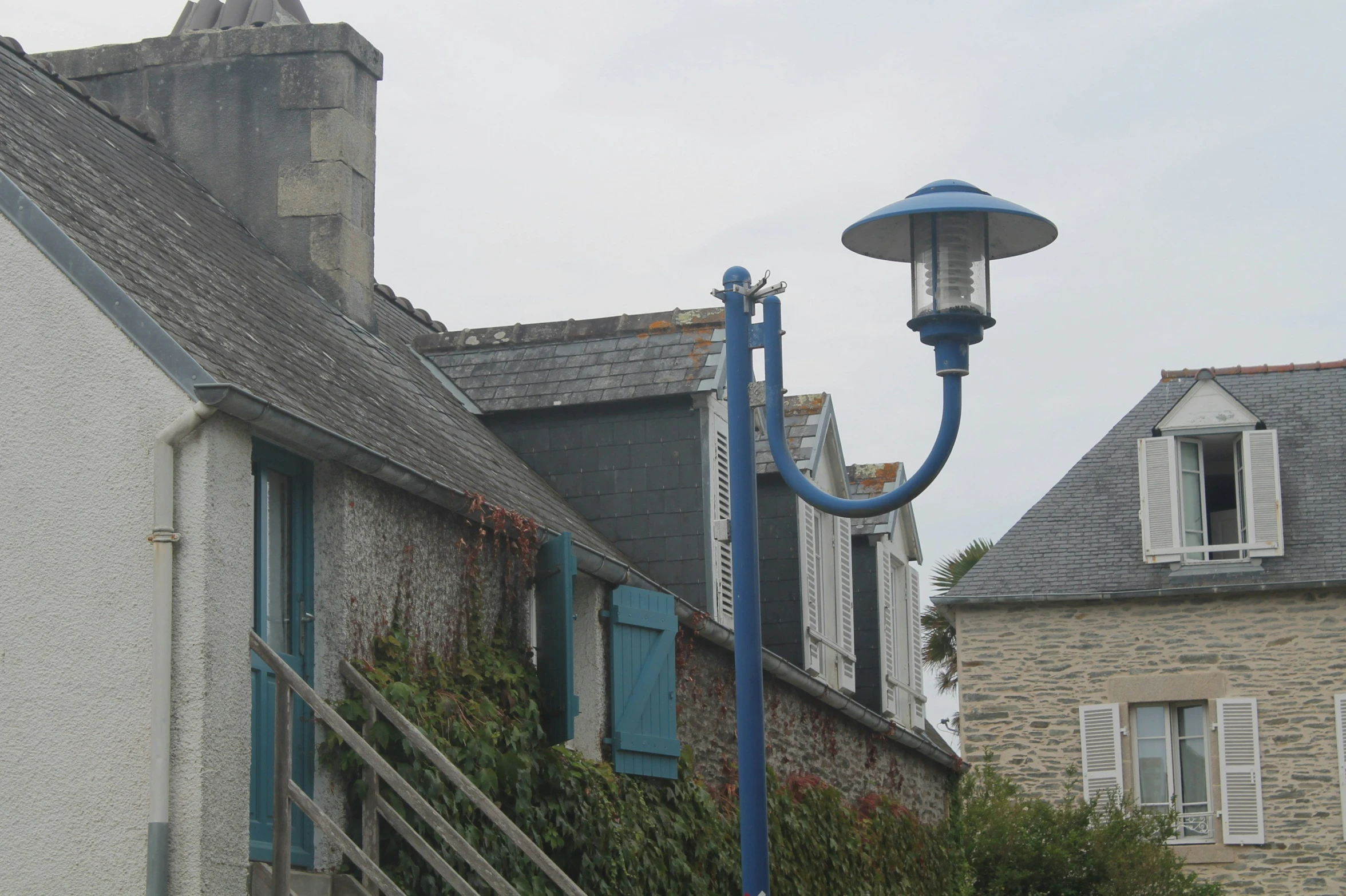 a blue light is attached to a building