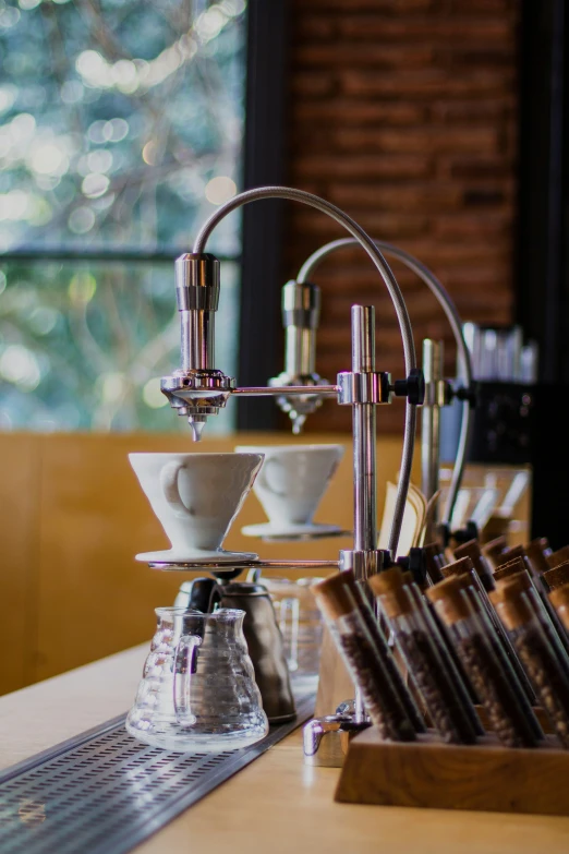 a table with coffee making equipment on it