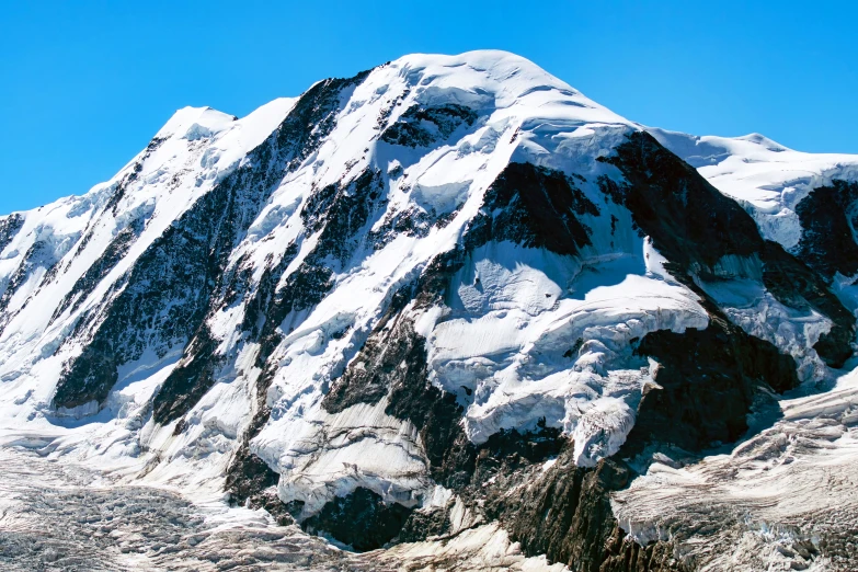 a high mountain with snow on the top