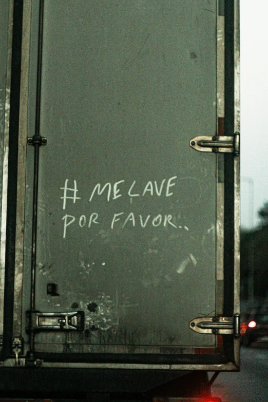 a truck has writing on the back door