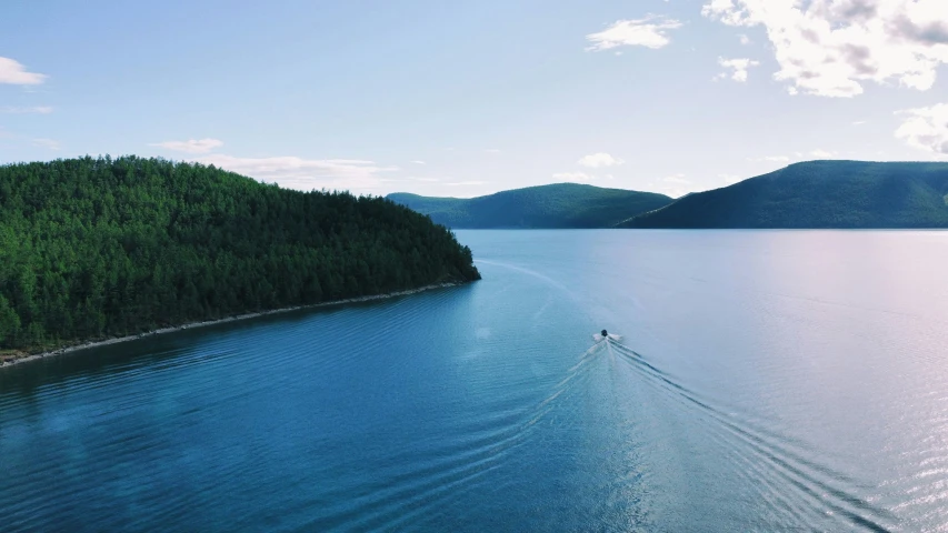 a boat that is traveling through some water