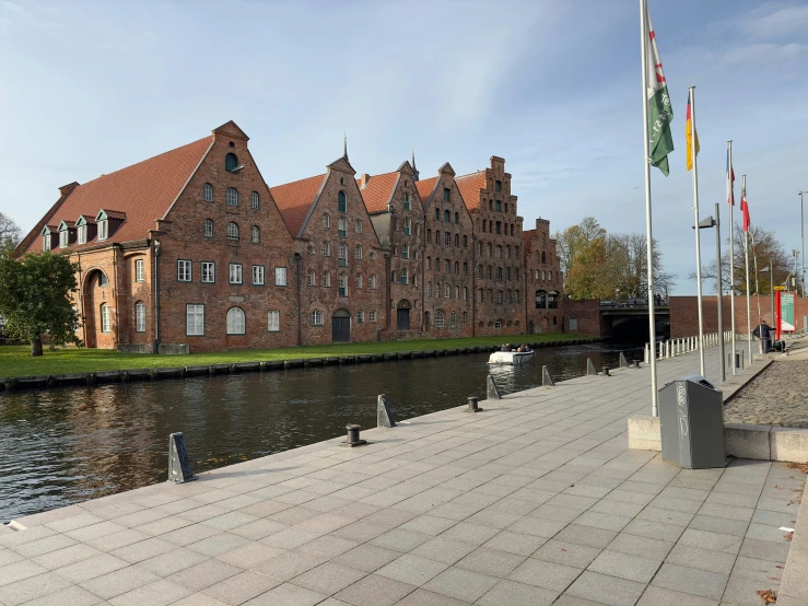 a very old brick building along the water