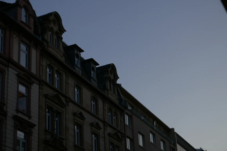 a very tall building with some windows on it's side