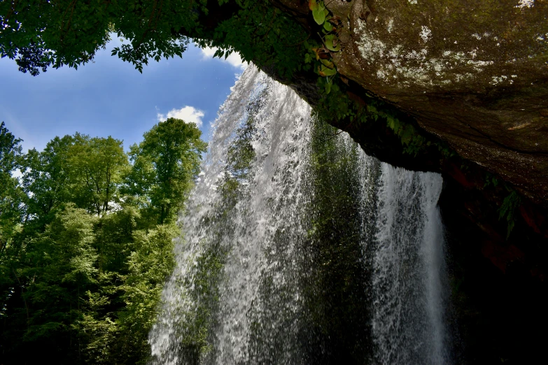 a waterfall with lots of water flowing in it