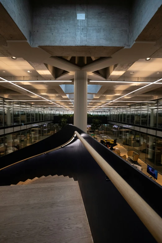 a huge building with lots of windows and skylights