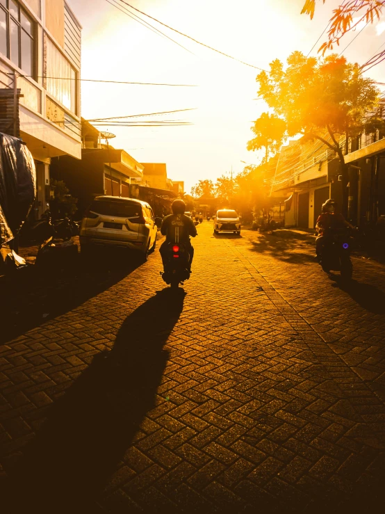 a person riding a bike in the street