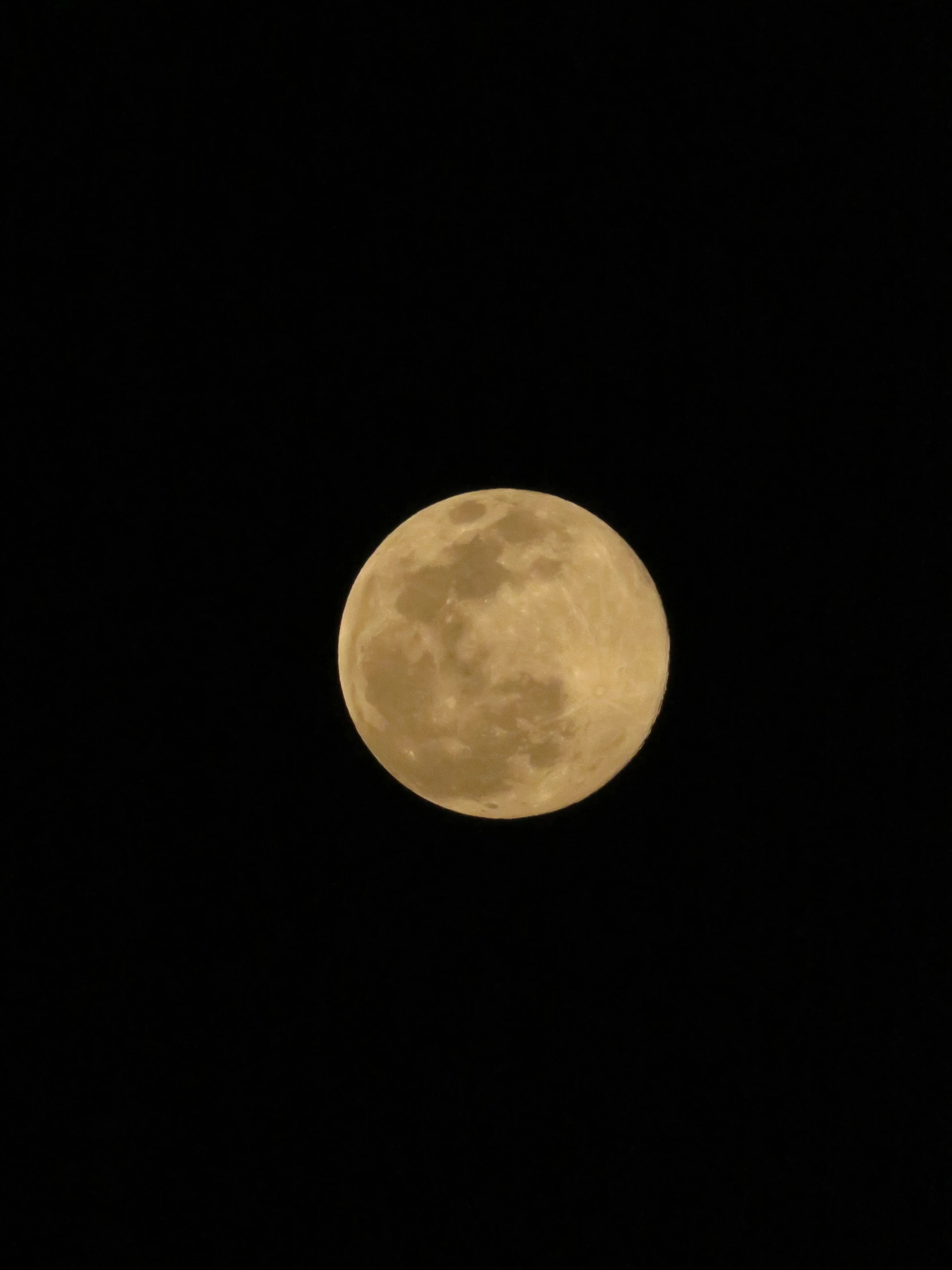 a full moon is shown in the dark night sky