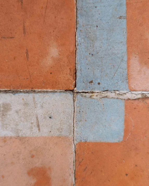 a close up s of an old brick wall with a stop sign on it