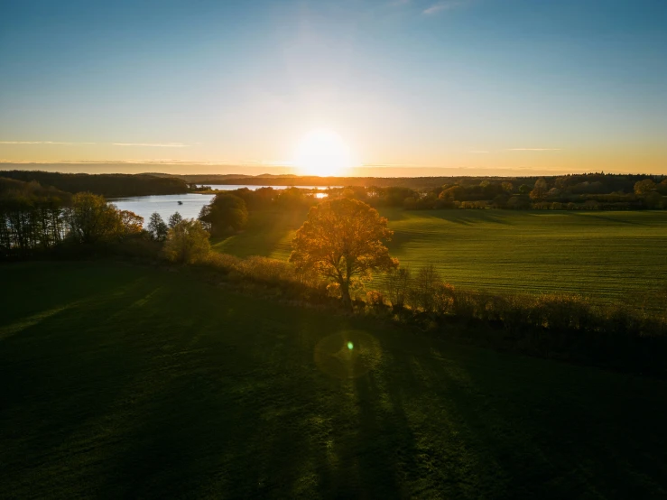 a field has been trimmed to make it appear that the sun has set