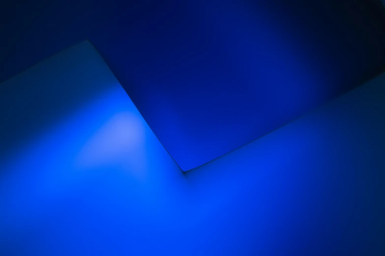 a wall with a blue lit area in it