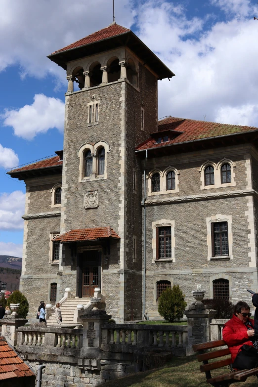 an old building with a clock tower above it