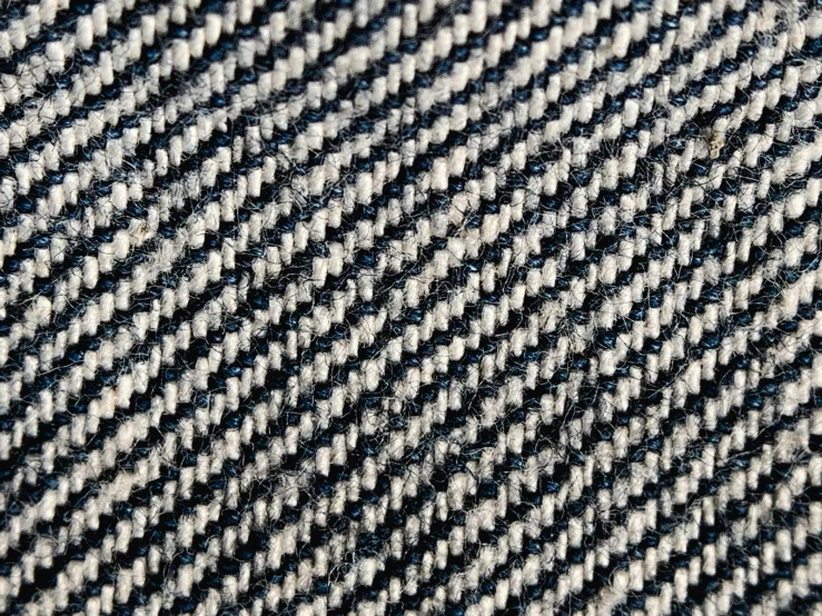 close up of fabric material made in black, grey, and white