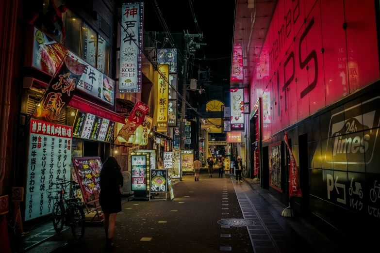 a street scene of a city at night