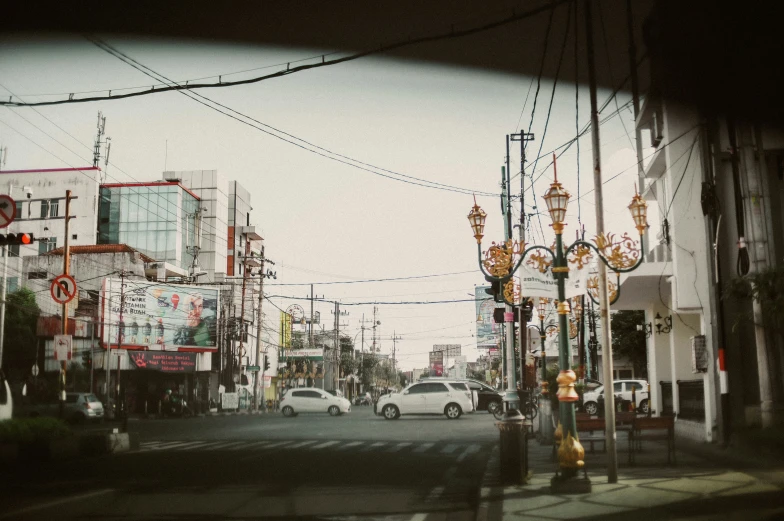 a street in the city filled with traffic