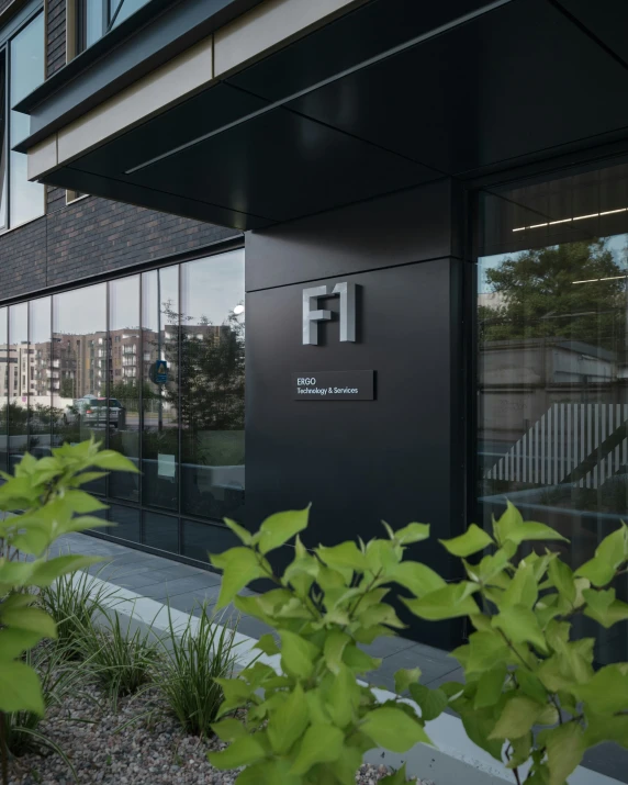 the exterior of an office building with many windows