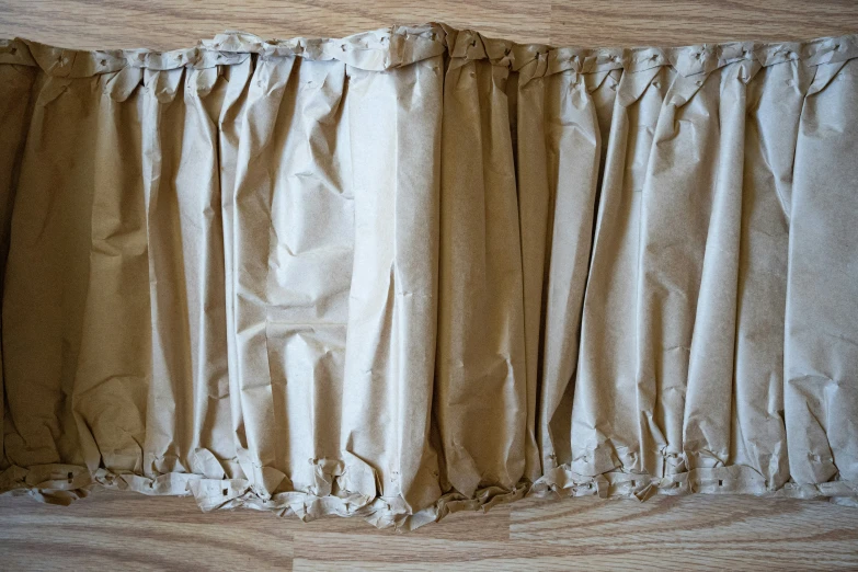 a view of the side of a curtain that is opened