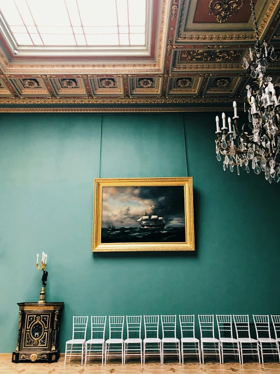 a painting with a ceiling and chairs underneath it