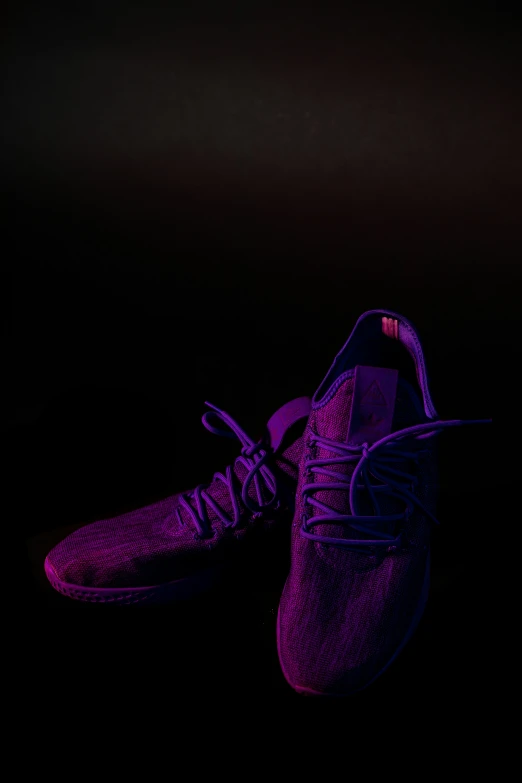 a shoe is pictured on a black background